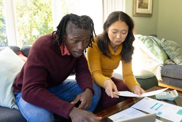 A diverse group of people looking worried as they try to read a very complex spreadsheet detailing housing costs, rent percentages, and income levels. The scene is set in a dimly lit community center, emphasizing the serious and stressful nature of the housing crisis.