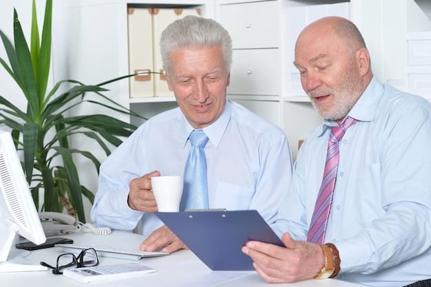 An older couple sitting at a table with a financial advisor, reviewing documents and discussing investment strategies, illustrating the importance of professional financial planning in adapting to potential Social Security changes.