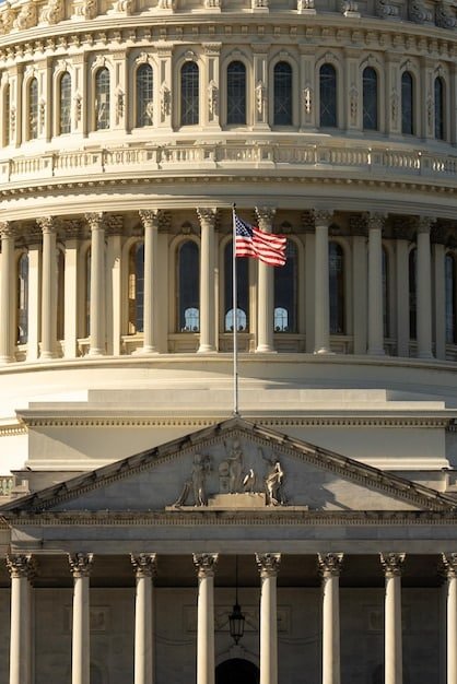 A close-up shot of U.S. currency, with a blurred image of the U.S. Capitol Building in the background, symbolizing potential legislative changes affecting student loans.