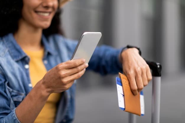 A close-up of a traveler's hands holding a credit card while booking a flight on a smartphone, highlighting the ease of using rewards for travel purchases.