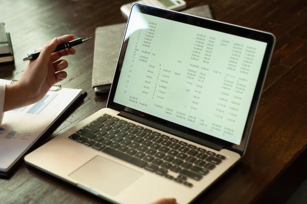 A close-up shot of a spreadsheet on a laptop screen, highlighting columns for debt type, interest rate, outstanding balance, and minimum payment, illustrating the process of assessing current debt.